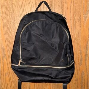 Lululemon Athletica Black Backpack with Gold Accents